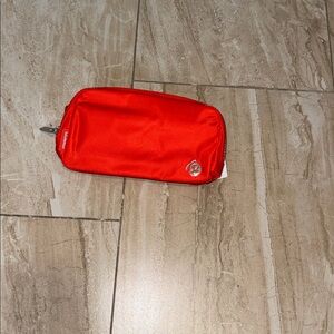 Lululemon everywhere belt bag, new. price tag removed, description tag attached